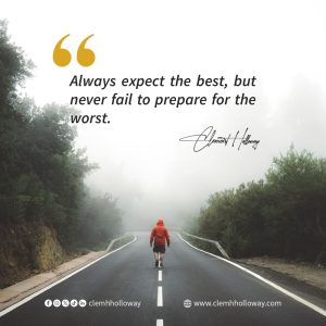 Person walking alone on a misty road with motivational quote overlay. 